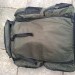 As a Barrow Bag with no straps